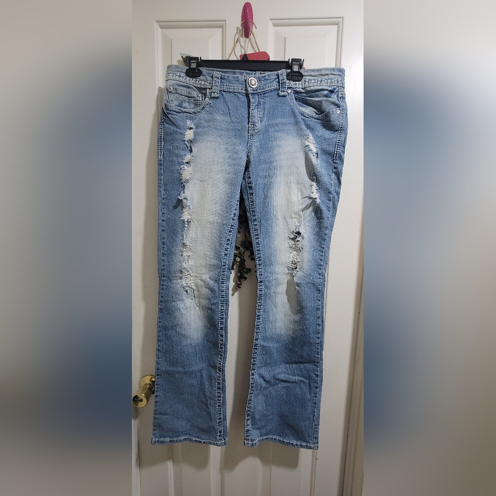 Distressed boot cut jeans